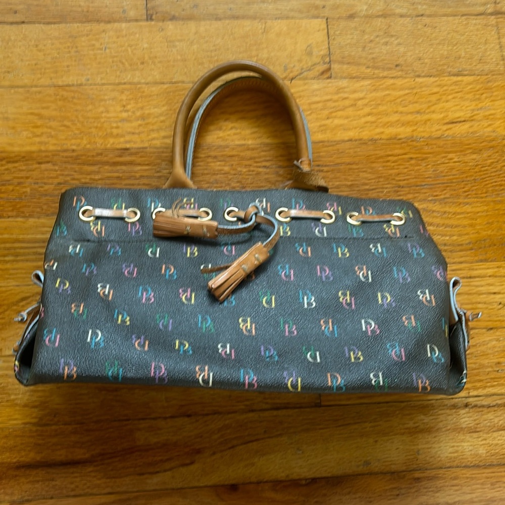 Dooney and Bourke Logo Leather Bag with Tassels and Heart Charm